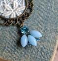 Load image into Gallery viewer, Sky Blue Crystal, Fabric, And Vintage Lace Art Nouveau Style Pendant