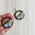 Load image into Gallery viewer, Whimsical Pastel Blue Daisy Earrings Made With Vintage Flowers And Wood Hoops