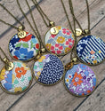 Load image into Gallery viewer, Vintage Floral Quilt Pendant With Initial Charm - Purple, Blue, And Orange