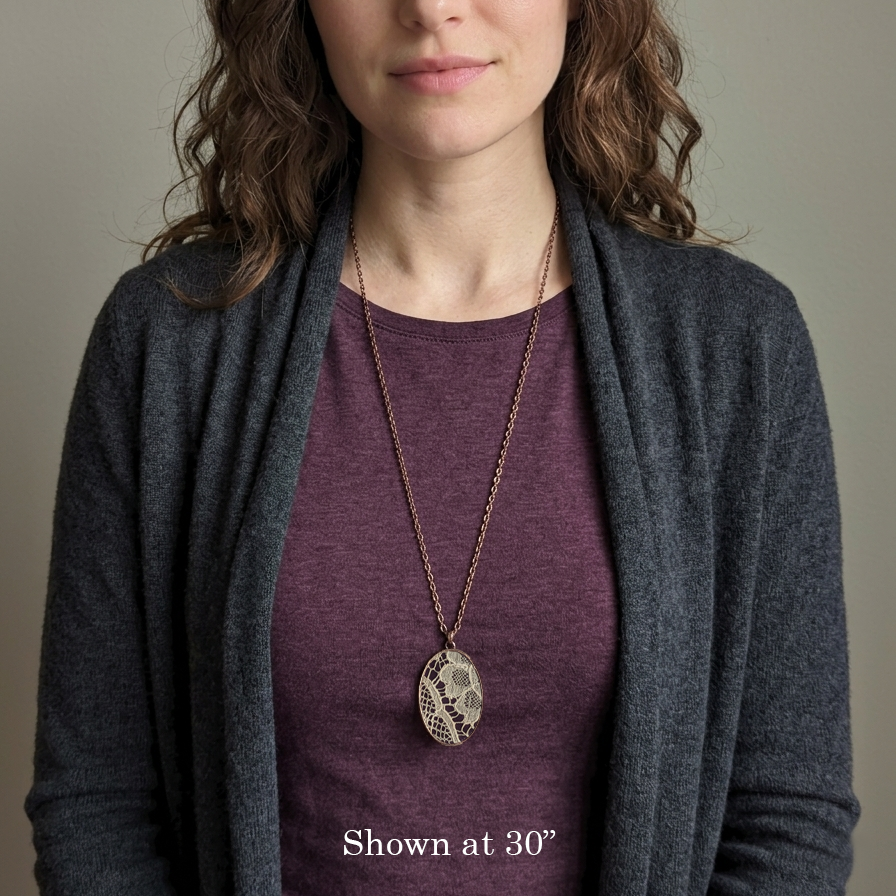 Copper Oval Pendant With 1920s French Lace On Burgundy Cotton