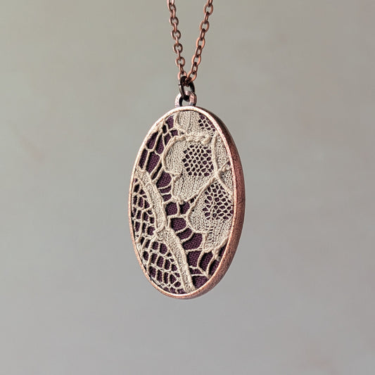Copper Oval Pendant With 1920s French Lace On Burgundy Cotton