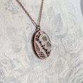 Load image into Gallery viewer, Copper Oval Pendant With 1920s French Lace On Burgundy Cotton

