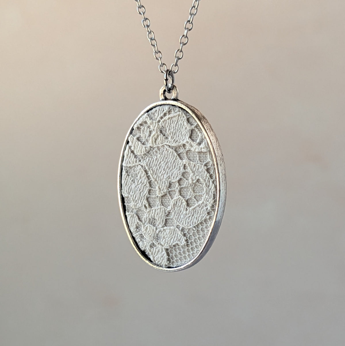 Silver Oval Pendant With Ivory 1920s French Lace