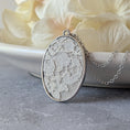 Load image into Gallery viewer, Silver Oval Pendant With Ivory 1920s French Lace
