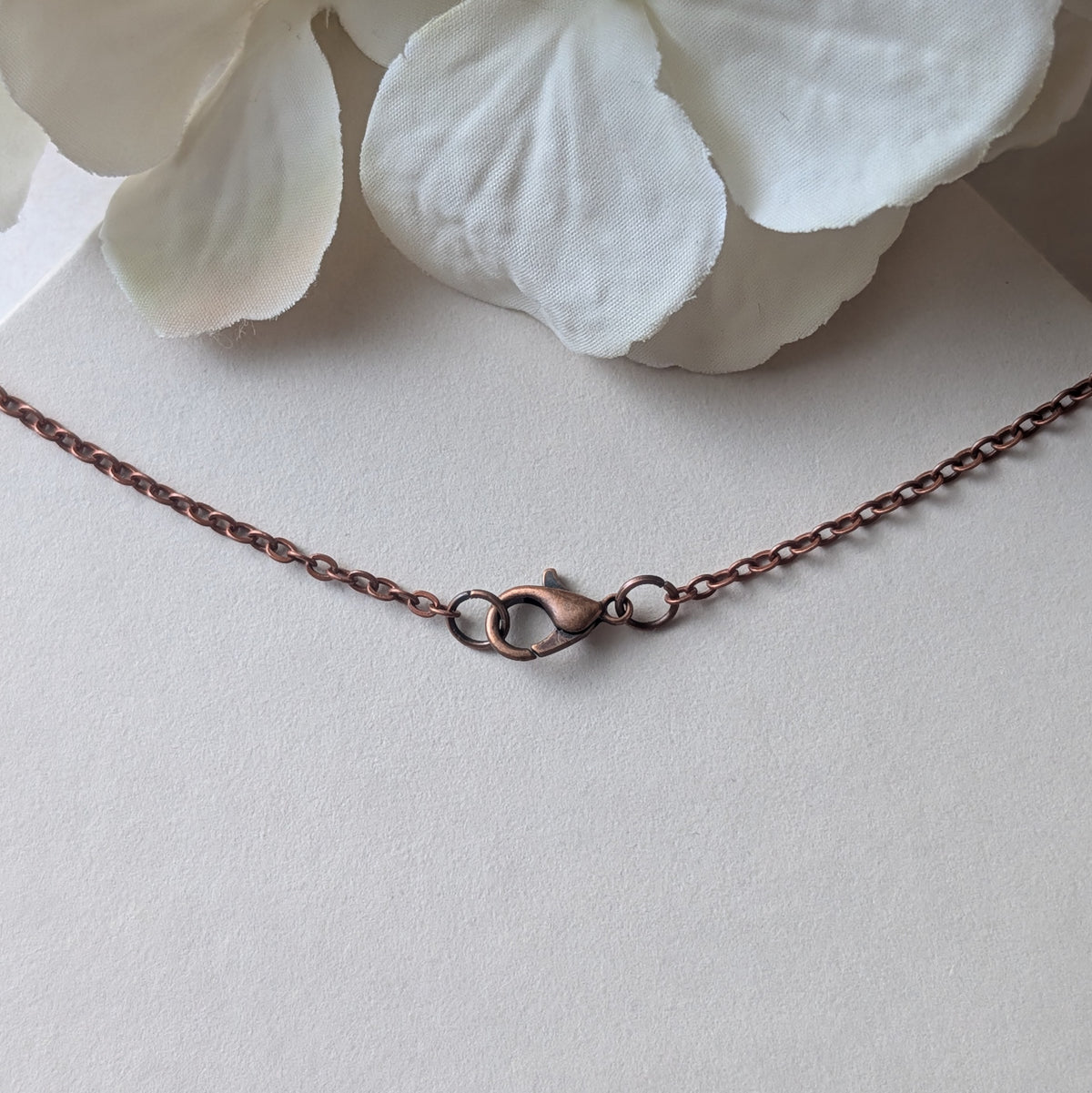 Copper Oval Pendant With 1920s French Lace On Burgundy Cotton